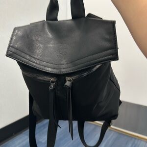 I am selling a black burlier New York backpack
